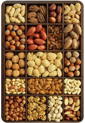 Wooden tray filled with assorted premium dry fruits and nuts at SG Dates & Nuts